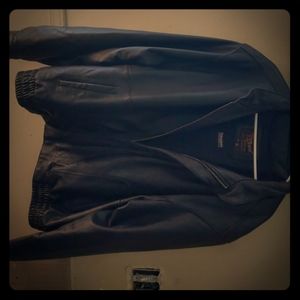 A vintage Reed's men's leather tote thinsulated.